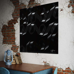 Ethereal Flow artwork featuring black undulating ribbons on a wall, creating a sense of light and motion in a meditative atmosphere.